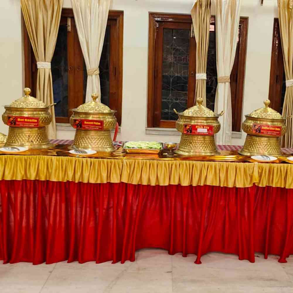Well-decorated buffet by Gharoa Catering showcasing elegant arrangements and delicious dishes.